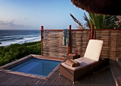 Wicker Sun Lounger on the deack overlooking the ocean at Massinga Beach Mozambique